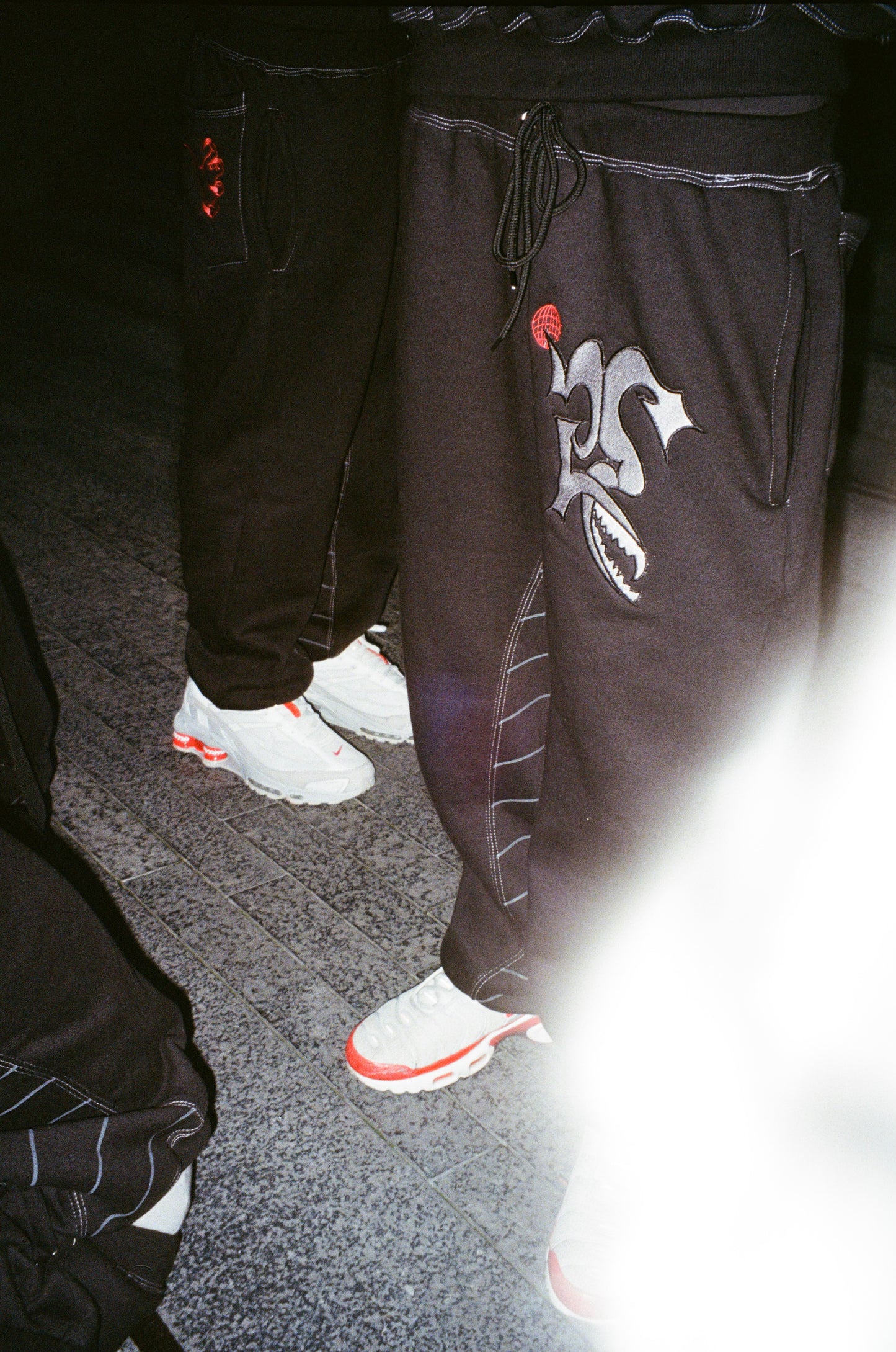 “Face the Grid” Tracksuit Bottoms